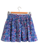 Luna Mini Skirt — cream and lavender daisy print on navy cotton mini skirt | Sur La Vague