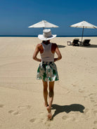 Hibiscus Mini Skirt — white and periwinkle floral block print on sage green cotton | Sur La Vague
