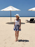 Indigo Garden Mini Skirt — cobalt wildflower block print cotton mini, A-line with pockets | Sur La Vague