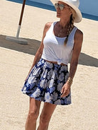 Indigo Garden Mini Skirt back view — block-printed wildflower on cobalt blue cotton | Sur La Vague
