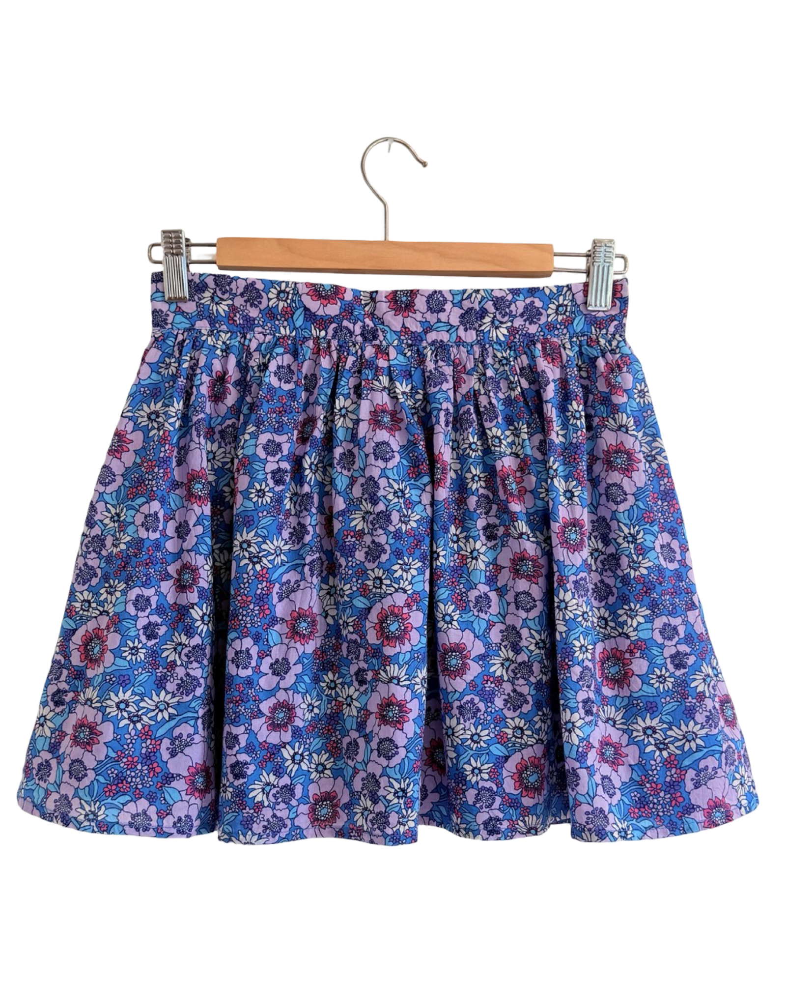 Luna Mini Skirt — cream and lavender daisy print on navy cotton, A-line mini skirt with pockets | Sur La Vague